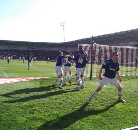 Paul Quiin shows just how much it means as City go in front in injury time. Scorer Koumas, No. 19 is the hero