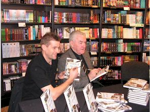 Dave Mackay and Phil Gee sign the new Derby County Book