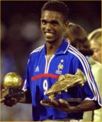 Florent Sinama Pongolle with the Golden Boot and Golden Ball