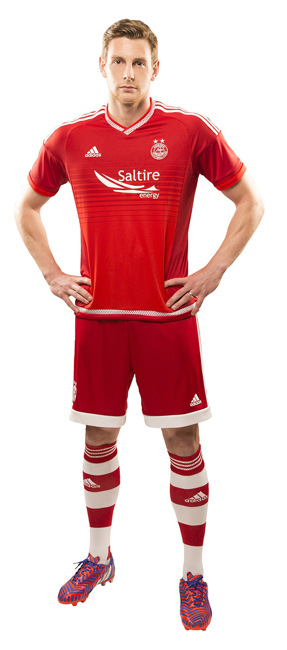 Ash Taylor in new Dons home kit