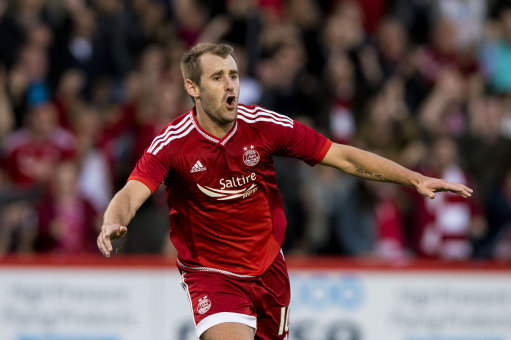 McGinn celebrates