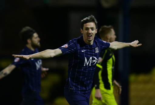 Southend United's David Mooney celebrates scoring his sides third goal of the game against Burton Albion.